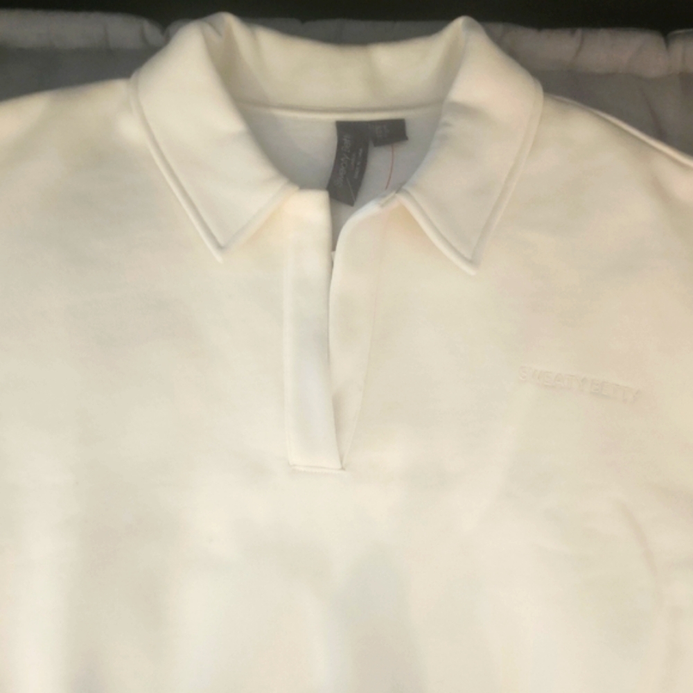 Sweaty Betty White Polo Sweater with Classic Collar and Textured Fabric